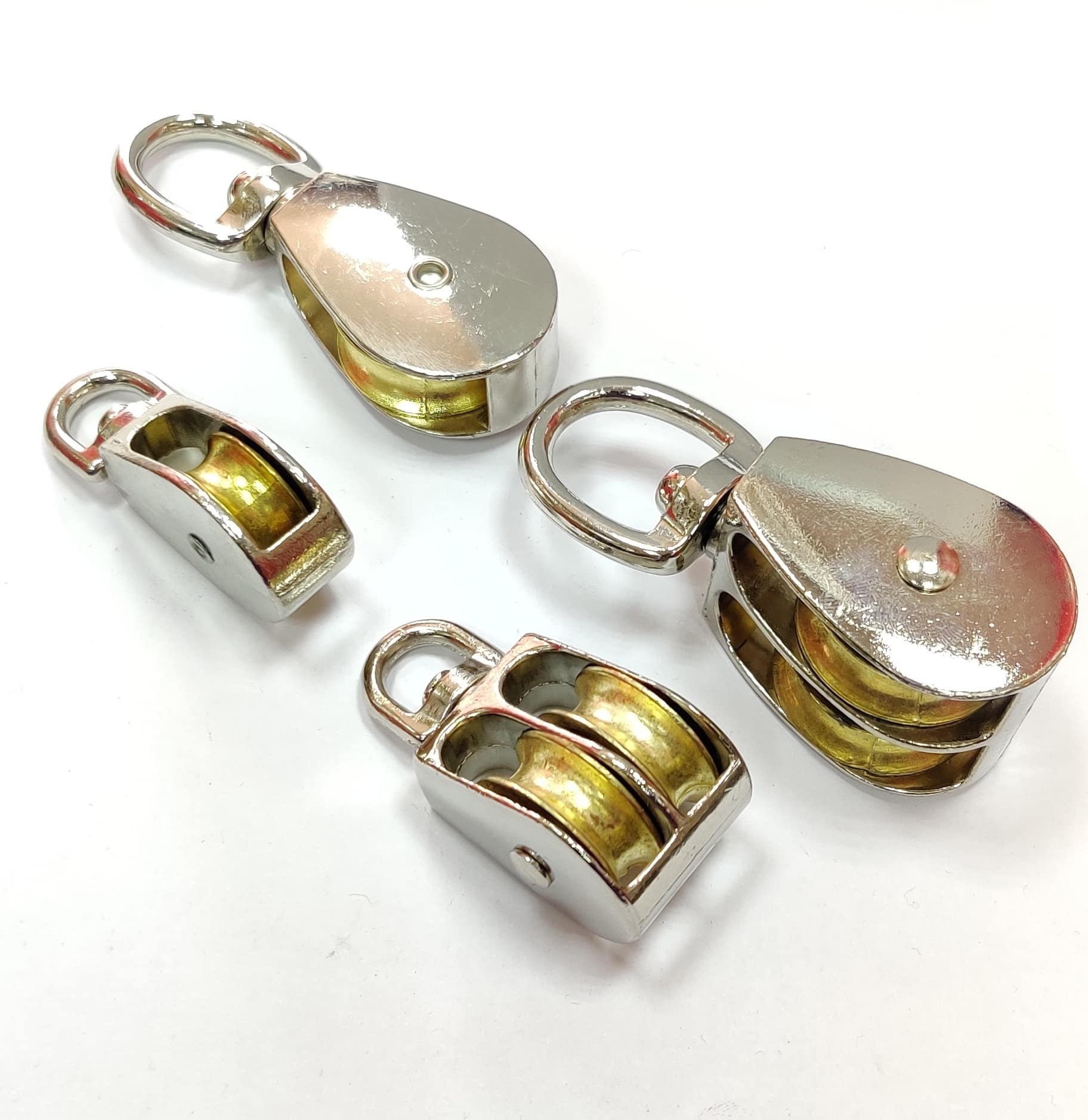 NICKELPLATED SWIVEL EYE PULLEY Piplodwala Hardware Trading Co.